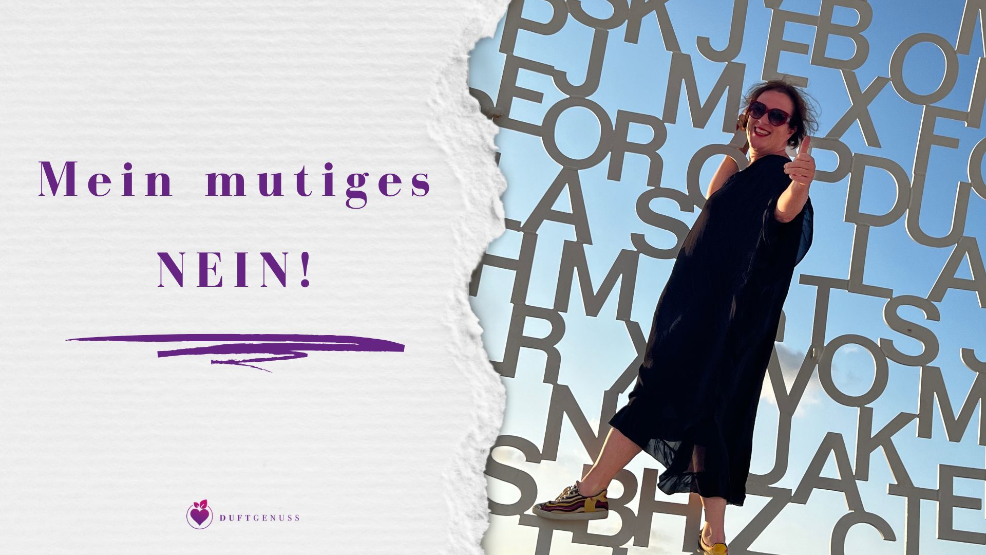 Barbara Tausch von duftgenuss.at vor dem Nomadenkopf in Antibes mit dem Schriftzug Mein mutiges NEIN für Grenzen setzen und Handlungsfähigkeit